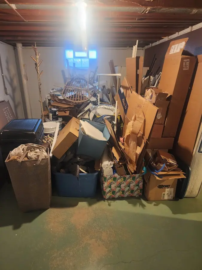 Roll-off dumpster container at job site for Yard Waste Dumpster Rental in Hitchcock